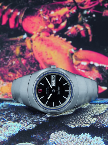 MEGASONIC 720 HZ, SO-CALLED LOBSTER Omega, Seamaster, Megasonic 720 Hz, Chronometer, No. 36247099, Ref. ST.398.0822. Made in 1973..Fine and rare,tonneau-shaped, center seconds, stainless steel electronic gentleman`.s wristwatch with date and an integral O