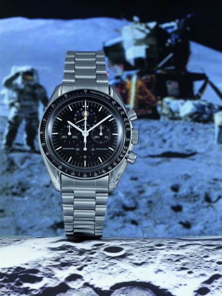 SO-CALLED SPEEDYMOON Omega, Speedmaster Professional, No. 47132828, Ref. ST 345.0809. Sold on June.27, 1986..Fine and rare, asymmetric, astronomic, water-resistant, stainless steel gentleman`s.wristwatch with round button chronograph, date, moon phases, 1
