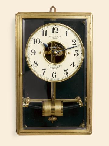 Bulle Electric Wall Regulator.Bulle-Clock, Patented, retailed by A.H. Rodanet.36, Rue Vivienne, Paris. Made circa 1920..Fine and rare, early, electric wall regulator with glazed brass.case.