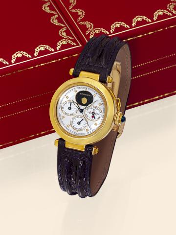 Pasha - Perpetual Calendar.Cartier, Pasha - Perpetual Calendar, No. 0975, Ref. M204646. Made in the 1990s..Very fine and rare, center-seconds, self-winding, water-resistant, 18K yellow gold gentleman's.wristwatch with perpetual calendar, moon phases and l