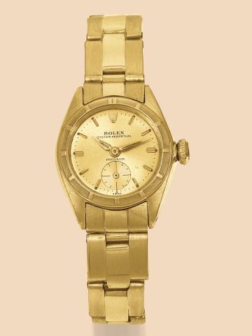 Rolex, Oyster Perpetual Precision, Ref..5003. Production started in the 1950s..Fine, self-winding, water-resistant, 18K yellow gold lady's.wristwatch with an 18K yellow gold Rolex Oyster bracelet.