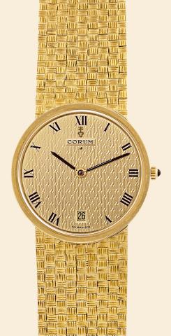 Yellow Gold.Corum, Automatic.Ref. 8752. Made in.the 1980s..Fine, self-winding, 18K yellow gold.wristwatch with date and an integrated.18K yellow gold textured Corum bracelet..To be sold without reserve