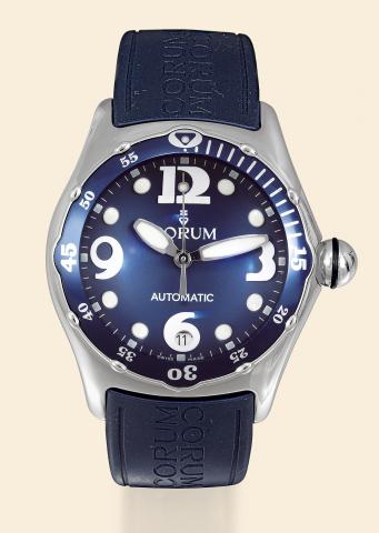 Steel Bubble.Corum, Bubble Watch.Automatic, No. 733.610.Ref. 82.180.20. Made circa 2000..Fine and unusual, center-seconds, selfwinding.water-resistant, curved, stainless.steel wristwatch with date, thick.domed crystal creating a lens effect.and a stainles