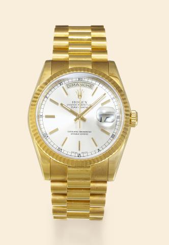 Yellow Gold Day-Date.Rolex, Oyster Perpetual Day-Date, Superlative.Chronometer Officially Certified.Ref. 118348, case No. P724756. Made in 2000..Very fine, center-seconds, self-winding, water-resistant, 18K.yellow gold wristwatch with day and date with a 