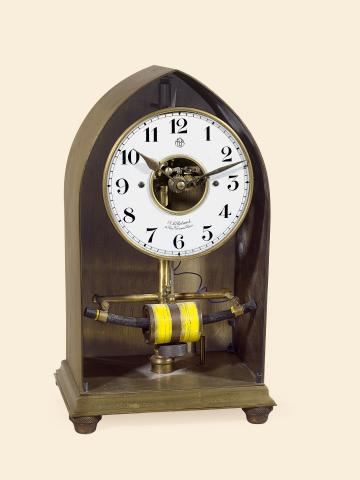 Bulle Electric Mantel Clock.Bulle-Clock, Patented, retailed by A.H..Rodanet, 36, Rue Vivienne, Paris. Made.circa 1920..Fine and rare, early, electric mantel clock with brass case.