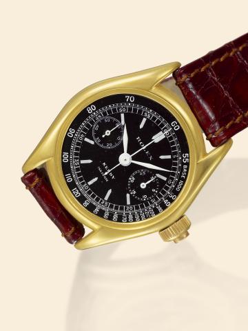 Ref. 2303, Yellow Gold Single Button Chronograph _ Black Dial.Rolex, case No. 16121, Ref. 2303. Made in 1935, retailed by Kerby..Very fine and extremely rare, small, 18K yellow gold wristwatch with co-axial button.chronograph, registers, tachometer, black