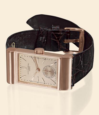 Ref. 599, Pink Gold Asymmetric.Patek Philippe & Co., Geneve, No. 833199, case No. 618590, Ref. 599. Made in 1939.sold on May 25th, 1939..Very fine and extremely rare, asymmetric, rectangular, 18K pink gold wristwatch with an 18K pink gold.Patek Philippe b