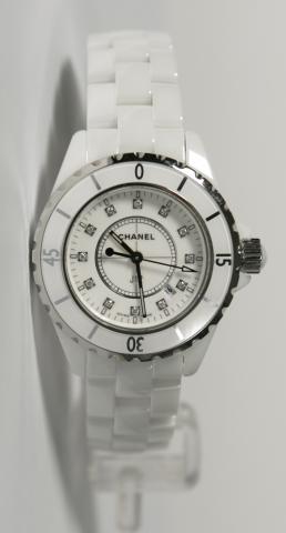 Chanel Quartz movement watch. White high-tech ceramic case and strap. White dial with 12 diamonds (0,07 k).