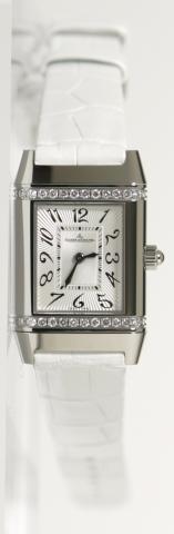 Jaeger Le Coultre Quartz movement watch. Steel reversible case with 28 diamonds (