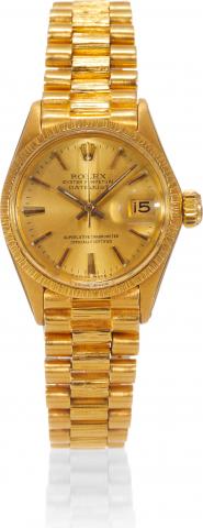 Yellow Gold Ref. 6527/6517.Rolex, Oyster Perpetual Date.Just, Superlative Chronometer Officially.Certified, case No. 1171914, Ref. 6517..Made in 1965..Fine, center-seconds, self-winding, waterresistant.18K yellow gold lady's wristwatch.with date and an 18