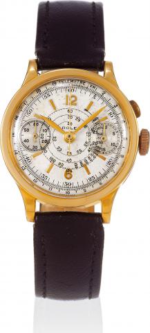 Monopoussoir.Rolex, case No. 25672, Ref. 2507. Made in 1928..Very fine and rare, large, 18K yellow gold wristwatch with olive-shaped single button.chronograph, register, tachometer and telemeter.