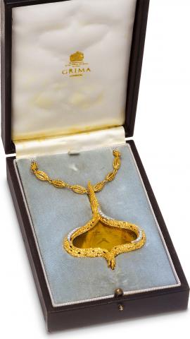 Summer Shadow.Omega by Andrew Grima, Summer Shadow.movement No. 20813452, Ref. BA 611524/ Grima.3172. Made in 1971..Unique and extremely fine, yellow and white gold, tourmaline.and diamond-set pendant watch with matching chain..Accompanied by the original