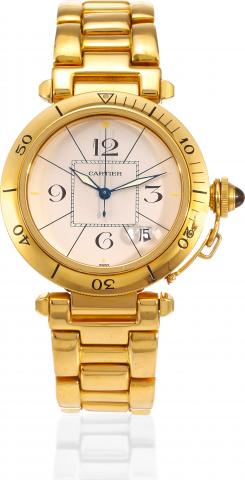Yellow Gold Pasha.Cartier, Pasha, case No. 820907, Ref. 0505. Made.in 1988..Fine, center seconds, self-winding, water-resistant, 18K yellow.gold wristwatch with date and an 18K yellow gold Cartier.bracelet with double deployant clasp.