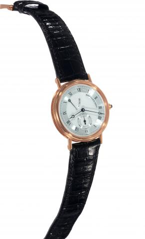 Power Reserve.Breguet, No. 599, Ref. 3380. Made circa 2000..Very fine, 18K yellow gold wristwatch with power-reserve and.an 18K yellow gold Breguet buckle.