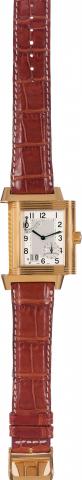 Reverso - Grande Date.Jaeger-LeCoultre, Reverso - Grande Date.Ref. 240.1.15. Made circa 2003..Very fine, large, rectangular and reversible, waterresistant.18K yellow gold wristwatch with large date.double spring barrels with 8-day power reserve and an.18K