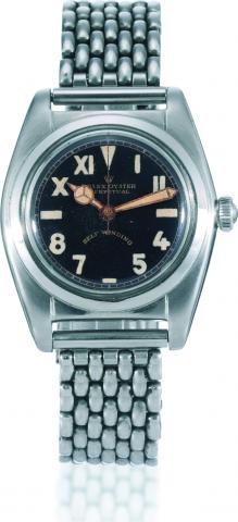 Ref. 2490, Army Dial.Rolex, Oyster Perpetual, Self-.Winding, case No. 423682, Ref. 2490..Made in 1945..Fine and rare, early, tonneau-shaped.center seconds, water-resistant, selfwinding.stainless steel wristwatch with.Oyster Patent crown and a stainless.st