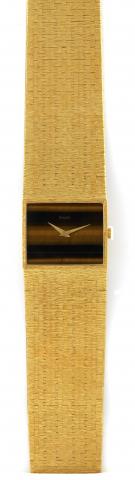 Piaget, No. 722491, case No. 212431, Ref. 4280.Made.in the 1980s..Fine and elegant, thin, horizontal rectangular, 18K.yellow gold wristwatch with a tiger