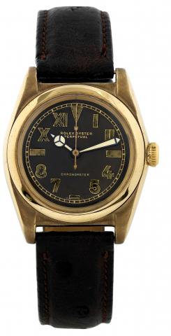 Ref. 3696 Black California Dial.Rolex,Oyster Perpetual, Chronometer, Ref. 3696.Made.in the 1940s..Fine and rare, tonneau-shaped, center seconds, self-winding.yellow gold and stainless steel wristwatch.