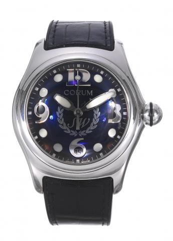 White Gold, Bubble.Corum, Bubble SW, case No..674835, Ref. 82.150.59.Made in the 2000s..Fine and unusual, large and curved, centerseconds.self-winding, water-resistant, 18K.white gold wristwatch with date, a thick.domed crystal creating a lens effect and 