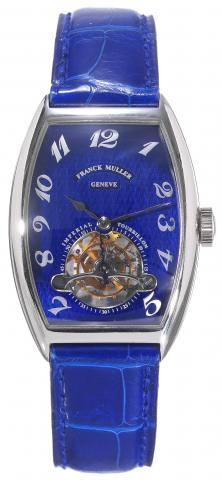 Imperial Tourbillon No. 09.Franck Muller, Cintr_e Curvex Imperial Tourbillon.No. 09, Ref. 585OT. Made in the 1990s..Very fine and rare, curved, tonneau-shaped, platinum wristwatch.with visible one-minute tourbillon regulator and an 18Kwhite gold.Franck Mu