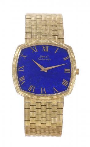 Lapis Lazuli Dial.Piaget, Automatic, case No..137213, Ref. 12401C4. Made in.the 1970s..Very fine, square, self-winding, 18K yellow.gold wristwatch with an integrated 18K.yellowgold Piaget textured bracelet. Accompanied.by a fitted Piaget box..To be sold w