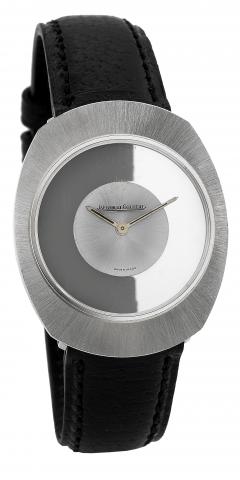 Jaeger-LeCoultre, case No. 1278699, Ref. 17006. Made.in the 1970s..Fine and unusual, mystery type tonneau-shaped 18K white gold.wristwatch with hooded lugs with a stainless steel Jaeger LeCoultre.buckle..To be sold without reserve