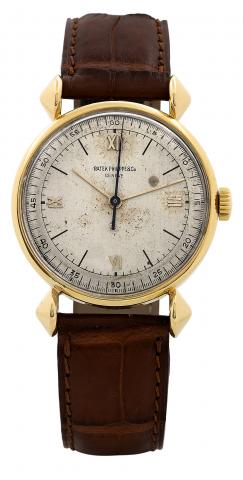 Ref. 1536.Patek Philippe & Cie, Geneve, No. 861721, case No. 650003, Ref. 1536. Made circa 1940..Fine and rare, center seconds, 18K yellow gold wristwatch.