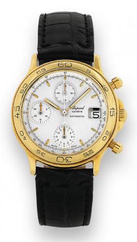 Gold Chronograph.Chopard Chronograph Automatic, Ref. 1181. Made in the 1990s..Fine, self-winding, water-resistant, wristwatch with round button chronograph, registers, tachometer and a.gold-plated Chopard buckle.