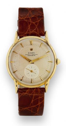 Ref. 4816.Rolex, Ref. 4816. Made circa 1951..Very fine and rare 18K yellow gold wristwatch with a gold-plated Rolex buckle..To be sold without reserve