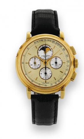 Yellow Gold.Ulysse Nardin, Chronograph, No. 534077, case.No. 2365, Ref. 531-22. Made in the 1990s..Fine, 18K yellow gold wristwatch with date, square button.chronograph, registers, phases of the moon and tachometer.