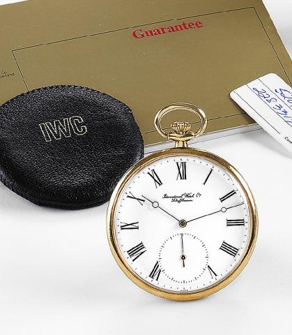 International Watch Co., Schaffhausen, No. 2315121, case No. 2283319, Ref. 5201. Made in the 1980s..Very fine and rare, thin, keyless, 18K yellow gold pocket watch. Accompanied by a pouch and guarantee.(now void).