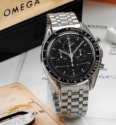 Speedymoon.Omega, Speedmaster Professional, No. 47132956, Ref. ST 345.0809. Made in 1985..Fine and rare, astronomic, water-resistant, stainless steel wristwatch with round button chronograph, date, moon phases.registers, black bezel with tachometer gradua
