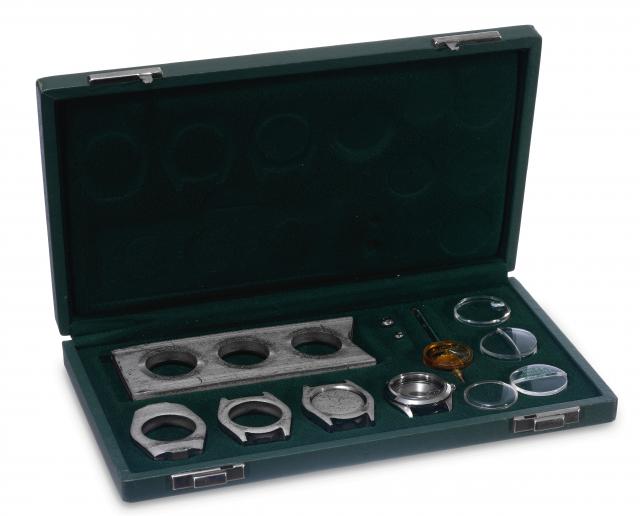 The World-Famous Oyster Case. Made in the 1970's..Rolex display case, demonstrating the manufacturing process of an Oyster watch case.