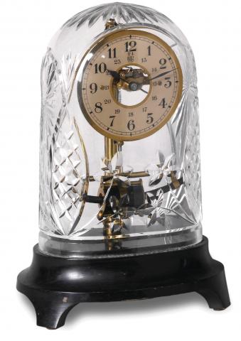 Cut Glass Bulle Clock.Bulle Clock, France, No. 270871..Made in the 1920's..Fine and very rare, cut glass and ebonized wood.electric table clock.