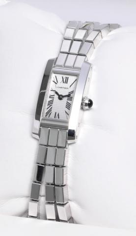 Tank American.Cartier, Tank American, case No. 12614CE, Ref..2544. Sold on September 20, 2004..Very fine and elegant, rectangular, water resistant, 18K white.gold lady