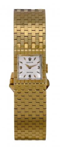 Ref. 8209, Gold Belt.Rolex Precision, case No..117989, Ref. 8209. Made circa 1950..Fine and rare, 18K yellow gold lady's.bracelet watch with an integral 18K.yellow gold Rolex bracelet in the form.of a belt and buckle..To be sold without reserve