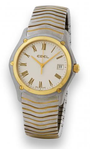 Steel & Gold Classic Wave.Ebel, No. E1255F41, Ref. A075153. Made in the.2000s..Fine, water resistant to 50 m, stainless steel and yellow gold.quartz wristwatch with date and a stainless steel Ebel link.bracelet with double deployant clasp..To be sold with