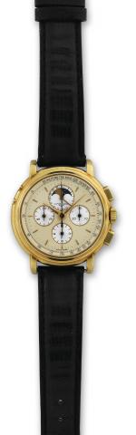 Yellow Gold.Ulysse Nardin, Chronograph, No. 534077, case.No. 2365, Ref. 531-22. Made in the 1990s..Fine, 18K yellow gold wristwatch with date, square button.chronograph, registers, phases of the moon and tachometer.
