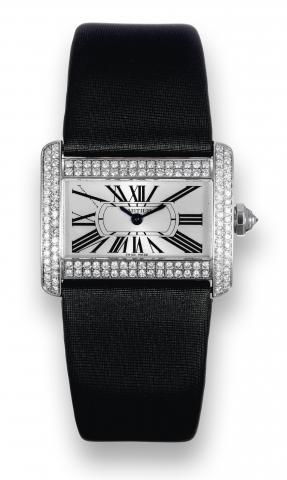 Tank Divan.Cartier, Tank Divan, case No. 997121CD, Ref. 2613..Made circa 2006..Fine and unusual, horizontal rectangular and curved, waterresistant.18K white gold and diamond-set lady
