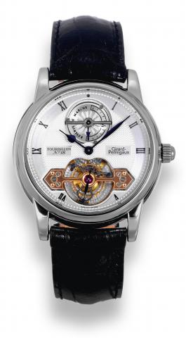 Platinum Tourbillon No. 18.Girard-Perregaux, La-Chaux-de-Fonds, Tourbillon.Reserve de Marche, No. 18, Ref. 9920. Made in the 1990s..Extremely fine and rare, platinum wristwatch with visible oneminute.tourbillon regulator under one 18K pink gold bridge.pow