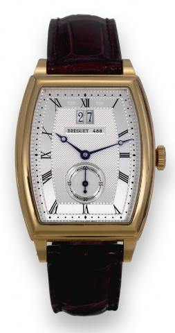 Yellow Gold Heritage.Breguet, Heritage, No. 488, Ref. 5480. Sold in April 2004..Very fine, large, tonneau-shaped and curved, self-winding, water-resistant, 18K yellow gold wristwatch with large date and an 18K.yellow gold Breguet deployant clasp. Accompan