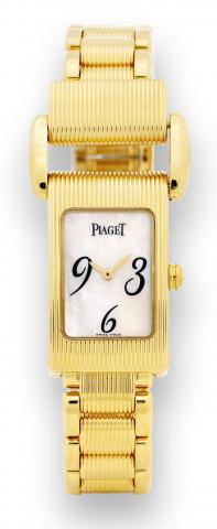 Yellow Gold.Miss Protocole.Piaget, Ref. 5321, made circa 2007..Fine and unusual, water resistant, 18K.yellow gold rectangular lady