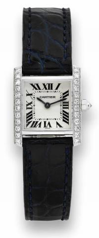 White Gold Tank Louis Cartier GM.Cartier, Tank Louis Cartier GM, No. GM 266951.Ref. 2365. Made circa 2000..Fine, square curved, water-resistant, 18K white gold and.diamond lady's quartz wristwatch with an 18K white gold.Cartier deployant buckle.