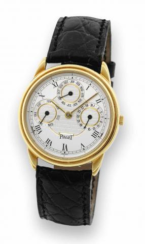 Triple Date Automatic.Piaget, Automatic, No. 882437, case No. 560054.Ref. 15959. Made in the 1990's..Fine, self-winding, 18K yellow gold wristwatch with triple.date and an 18K yellow gold Piaget buckle. Accompanied by.a fitted box.