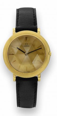 Omega Damier, No. 16224680, Ref. 14741. Produced in the early 1960's..Very fine and unusual, flat, water-resistant, 18K yellow gold mid-size wristwatch with multi-faceted crystal..Accompanied by an Omega sterling box..To be sold without reserve