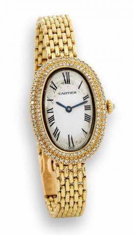 Diamond Baignoire.Cartier, Paris, Baignoire, case No. 782900168.Ref. 1954. Made circa 1990..Fine and elegant, oval, curved 18K yellow gold and diamondset.lady's bracelet wristwatch with an 18K yellow gold Cartier.deployant clasp.