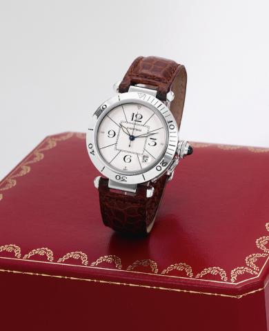 White Gold Pasha.Cartier, Pasha, No. 0037, Ref. 320903. Made circa 1990..Very fine, center-seconds, self-winding, water-resistant, 18K white gold wristwatch with date and an 18K white gold Cartier.deployant clasp. Accompanied by a Cartier box..To be sold 