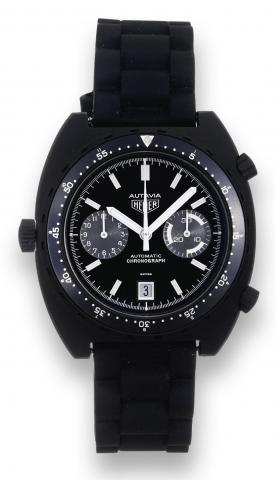 PVD-Coated Autavia.Heuer, Autavia, Automatic.Chronograph, No. 113.603. Made in.the 1970's..Fine, tonneau-shaped, self-winding.water-resistant, PVD-coated stainless.steel wristwatch with round button.chronograph, registers, crown at 9 and.date.