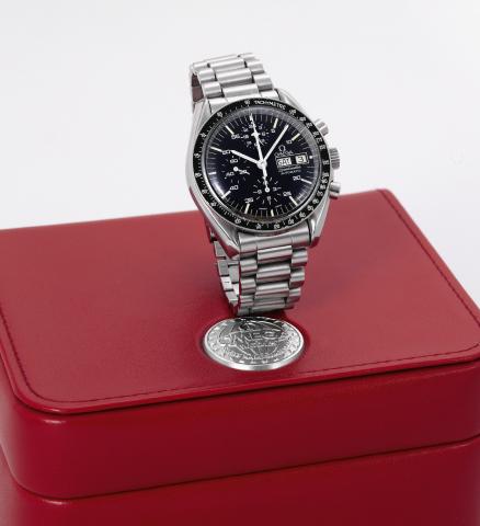 So-called Holy Grail.Omega, Speedmaster, Automatic, movement.No. 48231971, Ref. ST376.0822. Made in 800 examples.circa 1987..Fine and very rare, asymmetric, self-winding, water resistant.stainless steel wristwatch, round button chronograph, central.minute