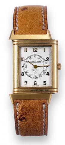 Yellow Gold Reverso.Jaeger LeCoultre, Reverso, case No. 1536162.Ref. 110.007.1. Made in the 1990's..Fine, rectangular, 18K yellow gold reversible quartz wristwatch.with an 18K yellow gold Jaeger LeCoultre buckle..To be sold without reserve